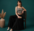 Women's Georgette Solid Mid-Rise Wide Leg Flared Palazzo with Elastic Waist (Black)
