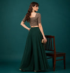 Women's Georgette Solid Mid-Rise Wide Leg Flared Palazzo with Elastic Waist (Bottle Green)