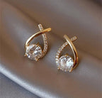 Generic Women's Pack of 2 Brass Gold Plated Crossover Twirl AD Stud Earrings (Gold)-PID68308